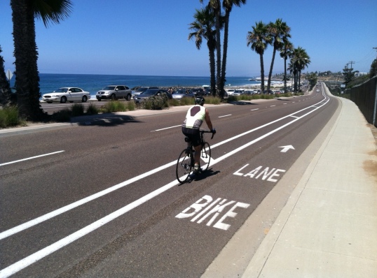 The city of Carlsbad narrowed vehicle travel lanes on the coast highway to create buffered bike lanes that increase safety.  Traffic speed limits were also lowered.  