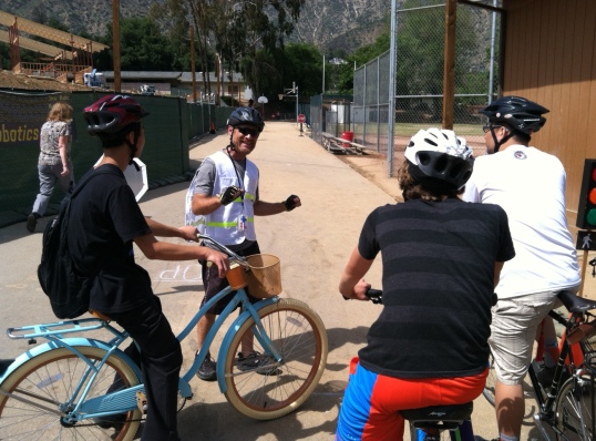 Jim Shanman of Walk n' Rollers leads a bike safety lesson at Sierra Madre Middle School. At right, volunteer instructor Andrew Fung Yip of BikeSGV looks on. 